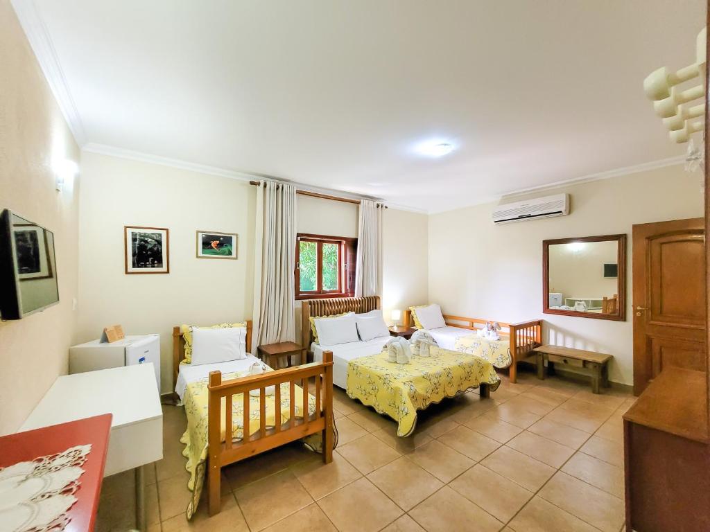 Quarto Standard Conjugado - Pousada Galeria Artes